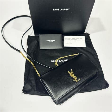 pochette telephone ysl|CASSANDRE phone holder in smooth leather .